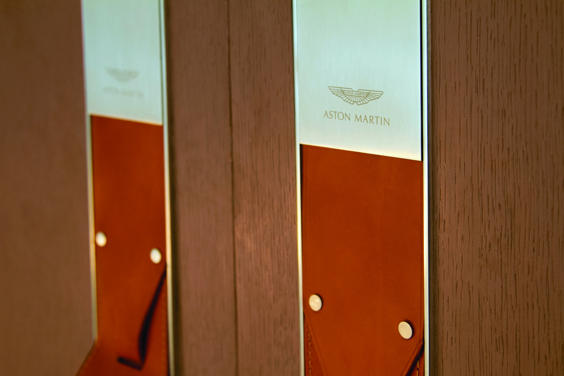 Aston Martin branded door hardware detail